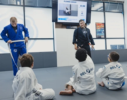 Children participating in a group class with Smoovi